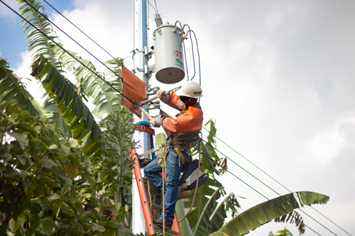 man working on electrical wires